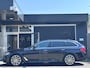 BMW 5-Serie Touring 520i High Executive M-SPORT / PANO / MEMORY / TREKHAAK