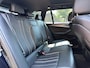 BMW 5-Serie Touring 520i High Executive M-SPORT / PANO / MEMORY / TREKHAAK