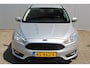 Ford Focus 1.0-125pk Titanium. Uiterst nette Ford Focus, slechts 54.000km ! Autm. airco dual, trekhaak, cruise control, navigatie, telefoonnvoorb., metallic lak, LM wielen, camera, parkeersensoren v+a, parkeerassistent etc.