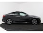 BMW 2-serie Gran Coupé 218i Business Edition Plus (PANORAMADAK, CAMERA, SFEERVERLICHTING, STOELVERWARMING, PARKEERSENSOREN)