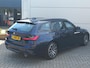 BMW 3-Serie Touring 318i 2.0 156pk Automaat Business Edition + M-pakket | SUMMER DEALS | Climate control | Navigatie | 18" LM velgen | Sport stoelen | NL-auto