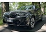 BMW iX3 High Executive 80 kWh PANO | ADAPTIVE | ACHTERUITKIJKCAMERA | MEMORY | CARPLAY | STOELVERWARMING |
