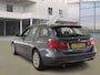 BMW 3-Serie Touring 320i Business/AIRCO/CRUISE/ELECRAMEN VOOR-ACHTER/NAVI/PARKEERSENS ACHTER