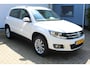 Volkswagen Tiguan 1.4 TSI Sport&Style | Incl. 12 maanden Garantie | 2e Eigenaar | Cruise controle | Climate controle | Parkeersensoren V+A | Navigatie | Automatisch inparkeren | 17 Inch LMV | Volledige onderhoudshistorie aanwezig | Origineel NL Auto | NAP |