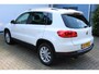 Volkswagen Tiguan 1.4 TSI Sport&Style | Incl. 12 maanden Garantie | 2e Eigenaar | Cruise controle | Climate controle | Parkeersensoren V+A | Navigatie | Automatisch inparkeren | 17 Inch LMV | Volledige onderhoudshistorie aanwezig | Origineel NL Auto | NAP |