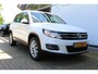 Volkswagen Tiguan 1.4 TSI Sport&Style | Incl. 12 maanden Garantie | 2e Eigenaar | Cruise controle | Climate controle | Parkeersensoren V+A | Navigatie | Automatisch inparkeren | 17 Inch LMV | Volledige onderhoudshistorie aanwezig | Origineel NL Auto | NAP |