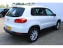 Volkswagen Tiguan 1.4 TSI Sport&Style | Incl. 12 maanden Garantie | 2e Eigenaar | Cruise controle | Climate controle | Parkeersensoren V+A | Navigatie | Automatisch inparkeren | 17 Inch LMV | Volledige onderhoudshistorie aanwezig | Origineel NL Auto | NAP |