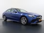 Mercedes-Benz C-klasse 300 e AMG Line Limited PHEV | PANORAMADAK | DISTRONIC (ACC) | ACHTERUITRIJCAMERA | DODEHOEKASSISTENT | AMBIENT LIGHTING | MERCEDES-DEALER ONDERHOUDEN | RIJKLAAR MET 12 MAANDEN BOVAG GARANTIE |