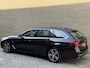BMW 5-Serie Touring 530e Business Edition Plus Luxury | Lederen bekleding | Adaptieve cruise | Lane assist | Harman&kardon | Head up | Camera | Navigatie | Apple CarPlay | Sfeerverlichting | Sportstoelen met memory | Stoelverwarming | 18 inch velgen | Full-LED | DAB | Elektrische achterklep | Dealeronderhouden