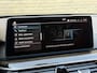 BMW 5-Serie Touring 530e Business Edition Plus Luxury | Lederen bekleding | Adaptieve cruise | Lane assist | Harman&kardon | Head up | Camera | Navigatie | Apple CarPlay | Sfeerverlichting | Sportstoelen met memory | Stoelverwarming | 18 inch velgen | Full-LED | DAB | Elektrische achterklep | Dealeronderhouden