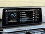 BMW 5-Serie Touring 530e Business Edition Plus Luxury | Lederen bekleding | Adaptieve cruise | Lane assist | Harman&kardon | Head up | Camera | Navigatie | Apple CarPlay | Sfeerverlichting | Sportstoelen met memory | Stoelverwarming | 18 inch velgen | Full-LED | DAB | Elektrische achterklep | Dealeronderhouden