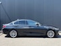 BMW 3-Serie 320i 184pk Aut. Luxury Leder Camera Navi LED Cruise Carplay Sfeerlicht