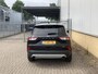 Ford Kuga 2.5 PHEV 225 pk Titanium Winter Pack - Draadloos opladen telefoon Origineel NL auto met weinig km.