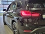 BMW X1 xDrive25e High Executive Sportline | Black Edition | Panorama | Trekhaak | Camera | Stoelverwarming