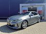 BMW 1-Serie 118i Introduction Edition | Navigatie | Skyscraper Grau | Cruise Control | Climate Control | Automatische 2-zone airconditioning | BMW Live Cockpit Plus | BMW M 50 Jahre uitvoering