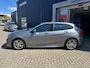BMW 1-Serie 118i Introduction Edition | Navigatie | Skyscraper Grau | Cruise | Climate Control | Automatische 2-zone airconditioning | BMW Live Cockpit Plus | BMW M 50 Jahre uitvoering