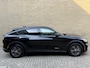 Ford Mustang Mach-E Extended RWD 98 kWh | 95% SOH | Trekhaak afneembaar | Panoramadak | Adaptieve cruise | Lederen bekleding | 360 camera| Dodehoekdetectie | Stoel&stuurverwarming | Apple CarPlay | Bang&Olufsen audio | Elektrische achterklep | Volledig onderhouden