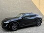 Ford Mustang Mach-E Extended RWD 98 kWh | 95% SOH | Trekhaak afneembaar | Panoramadak | Adaptieve cruise | Lederen bekleding | 360 camera| Dodehoekdetectie | Stoel&stuurverwarming | Apple CarPlay | Bang&Olufsen audio | Elektrische achterklep | Volledig onderhouden
