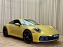 Porsche 992 911 3.0 Carrera S / 450 PK / Paint to Sample / PTS Yellow Storm / 18-way Seats / BOSE / Race-Tex / Alcantara / ACC / Sportuitlaat