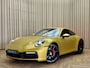 Porsche 992 911 3.0 Carrera S / 450 PK / Paint to Sample / PTS Yellow Storm / 18-way Seats / BOSE / Race-Tex / Alcantara / ACC / Sportuitlaat