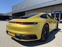 Porsche 992 911 3.0 Carrera S / 450 PK / Paint to Sample / PTS Yellow Storm / 18-way Seats / BOSE / Race-Tex / Alcantara / ACC / Sportuitlaat