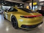 Porsche 992 911 3.0 Carrera S / 450 PK / Paint to Sample / PTS Yellow Storm / BOSE / Race-Tex / Alcantara / ACC / Sportuitlaat