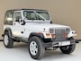 Jeep Wrangler 2.5 Softtop Laredo, 107Pk, 1990, Trekhaak, Lichtmetalen velgen, LED koplampen, Historie