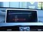 BMW X1 xDrive20i High Executive / Panorama / Sportstoelen
