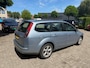 Ford Focus Wagon 1.8-16V Ambiente Flexifuel /bj/2007 / kleur: blauw / climate / cruise/ sportvelgen / APK 10/2026 / NAP 253030 km.