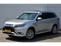 Mitsubishi Outlander PHEV 2.4 INSTYLE 4WD | PLUG IN HYBRID | V2H | SOH 75% | FULL OPTIONS | LEDER | SCHUIFDAK | ADAPTIEF CRUISE | ALL SEASON BANDEN | FABRIEKSGARANTIE TOT 09-06-2029* | ALL IN RIJKLAARPRIJS