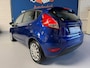 Ford Fiesta 1.25 Titanium / bj.2013 / 5 deurs / airco / kleur : blauw / 4 nieuwe banden/etc. APK tot 05/2027 en NAP met 246387 km.