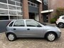 Opel Corsa 1.2-16V Essentia, bj.2003,grijs,5 deurs,airco,APK tot 10/2026 en NAP met 221140 km.stuurbekrachtiging,zeer zuinige auto