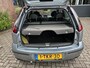 Opel Corsa 1.2-16V Essentia, bj.2003,grijs,5 deurs,airco,APK tot 10/2026 en NAP met 221140 km.stuurbekrachtiging,zeer zuinige auto
