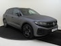 Volkswagen Touareg 3.0 TSi eHybrid 4MOTION R Edition | SoH 95% | Panoramadak | Luchtvering | Lederen bekleding 'Vienna' | Matte lak | 4-zone airco | Stoel- en stuurwielverwarming | Adaptieve cruise control | Keyless |