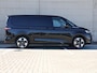 Volkswagen Multivan Bulli Edition L2 1.5 eHybrid EU6 180 kW 245pk | 2 Persoons bed | 7 Zits | Navigatie | Trekhaak | Panorama dak | 19 inch Lm velgen | ACC | Apple Carplay | Elek. bedienb. Schuifdeuren en achterklep | IQ Light |