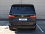 Volkswagen Multivan Bulli Edition L2 1.5 eHybrid EU6 180 kW 245pk | 2 Persoons bed | 7 Zits | Navigatie | Trekhaak | Panorama dak | 19 inch Lm velgen | ACC | Apple Carplay | Elek. bedienb. Schuifdeuren en achterklep | IQ Light |