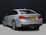 BMW 4-Serie Gran Coupe 420i M Sport [SCHUIFKANTELDAK, CRUISE, STOELVERWARMING, HEAD UP, CAMERA, PDC V+A, ELEKTRISCHE ACHTERKLEP, BLUETOOTH, DUAL ZONE CLIMATE, VOL LEDER, NAVIGATIE, NIEUWSTAAT]