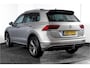 Volkswagen Tiguan 2.0 TSI 4Motion Highline Business R 180 PK | R-Line | Elek. Trekhaak | Adapt. Cruise | Stoel-+Bankverw. | PDC | Camera | NAV + App. Connect | ECC | Elek. Klep | LM 19" |