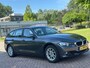 BMW 3-Serie Touring 320i Business/AIRCO/CRUISE/ELECRAMEN VOOR-ACHTER/NAVI/PARKEERSENS ACHTER