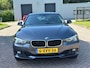 BMW 3-Serie Touring 320i Business/AIRCO/CRUISE/ELECRAMEN VOOR-ACHTER/NAVI/PARKEERSENS ACHTER