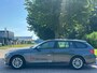 BMW 3-Serie Touring 320i Business/AIRCO/CRUISE/ELECRAMEN VOOR-ACHTER/NAVI/PARKEERSENS ACHTER