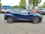 Toyota C-HR / C-HR+ 1.8 Hybrid 140 EXECUTIVE NL-AUTO 1E-EIG STOELVERW BLIND SPOT EL-ACHTERKLEP JBL-AUDIO EL-STOEL 19'' LM-VELGEN PARK-SENSOREN CLIMA AD-CRUISE APPLE/ANDROID