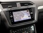 Volkswagen Tiguan 1.5 TSI Highline Sport 150Pk Automaat (PANORAMADAK, GROOT NAVI, CLIMATE, STOELVERWARMING, SPORTSTOELEN, PARKEERSENSOREN, ADAPTIVE CRUISE, NIEUWSTAAT)