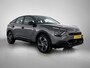 Citroën E-C4 You 50 kWh 136pk | Accu 96% | Navigatie via Apple Carplay / Android Auto | Achteruitrijcamera | Climate Control | Cruise Control | Parkeersensoren | DAB+ radio | Armsteun | Stof/kunstlederen comfortstoelen | Volledig digitaal instrumentenpaneel | Adaptief demping systeem | 18” lichtmetalen velgen |