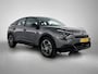 Citroën E-C4 You 50 kWh 136pk | Navigatie via Apple Carplay / Android Auto | Achteruitrijcamera | Climate Control | Cruise Control | Parkeersensoren | DAB+ radio | Armsteun | Stof/kunstlederen comfortstoelen | Volledig digitaal instrumentenpaneel | Adaptief demping systeem | 18” lichtmetalen velgen |