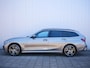 BMW 3-Serie Touring 330e xDrive High Executive 292 Pk Automaat Navi / DAB / Apple Carplay / Leer / M-pakket / Pano-dak