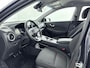 Hyundai Kona Electric EV Comfort 64 kWh | Soh 97,0% | Trekhaak | Camera | Adaptieve Cruise | Carplay/Android auto | Stoel stuur verwarming | Clima |
