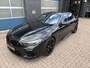 BMW 8-serie Gran Coupé M8 Competition, all black.