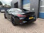 BMW 8-serie Gran Coupé M8 Competition, all black.