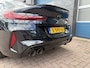 BMW 8-serie Gran Coupé M8 Competition, all black.